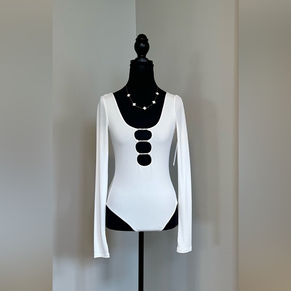 Alice + Olivia Tops - Alice + Olivia Black and White Long Sleeve Bodysuit with Cut Out Design